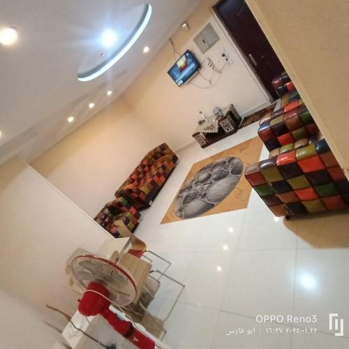 an overhead view of a living room with a couch at Aswan mallblaza in Aswān