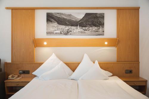 Katil atau katil-katil dalam bilik di Die Sabine & dein Hotel in Galtür