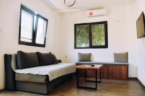 AGH Elite Apartments & Studiosにあるベッド