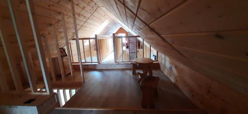 an overhead view of a room in a wooden house at Domek pod Skiełkiem in Łukowica