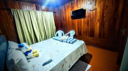 a room with a table with a white table cloth at Encarnacion House in Encarnación