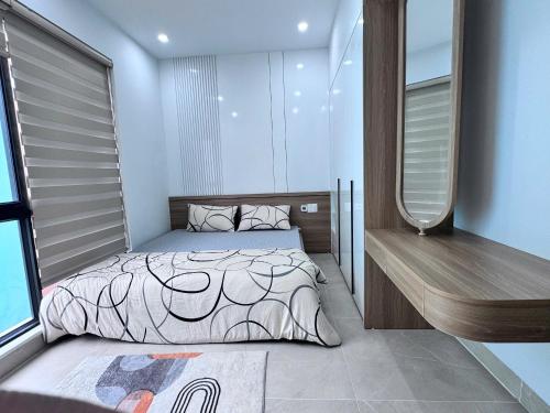 Giường trong phòng chung tại Homestay Hoàng Gia - Vinhomes Vũ Yên -Thuỷ Nguyên