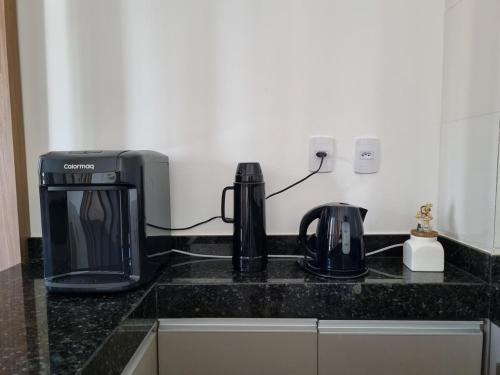 Aconchego em Araxá - Perto de Tudoにあるキッチンまたは簡易キッチン