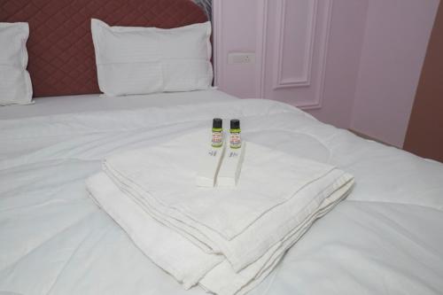 Ένα ή περισσότερα κρεβάτια σε δωμάτιο στο HOTEL LIME WOOD