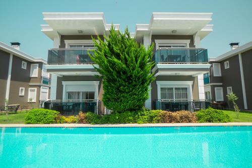 Бассейн в Sweet Home Kemer Apartments или поблизости
