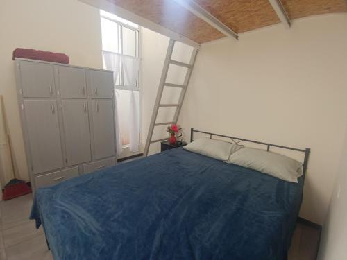 Ένα ή περισσότερα κρεβάτια σε δωμάτιο στο Apartment in Paseos de Chihuahua
