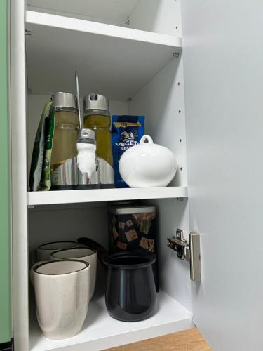 Mirabilis Apartmentsにあるキッチンまたは簡易キッチン