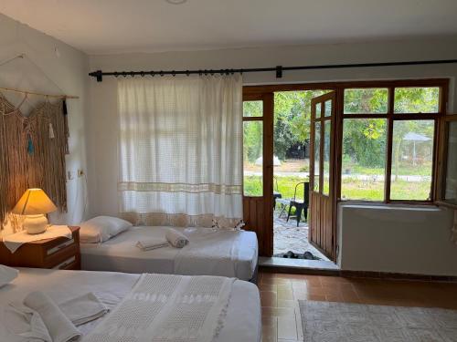Postel nebo postele na pokoji v ubytování Phaselis Park Camping