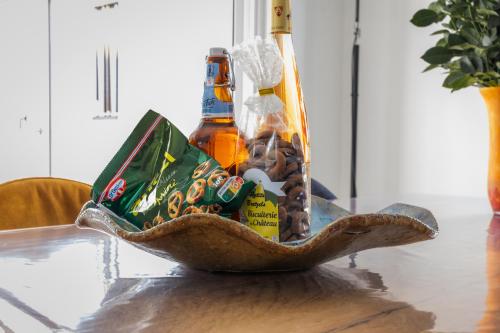 a basket of beer bottles on a table at Gite des cigognes in Kintzheim