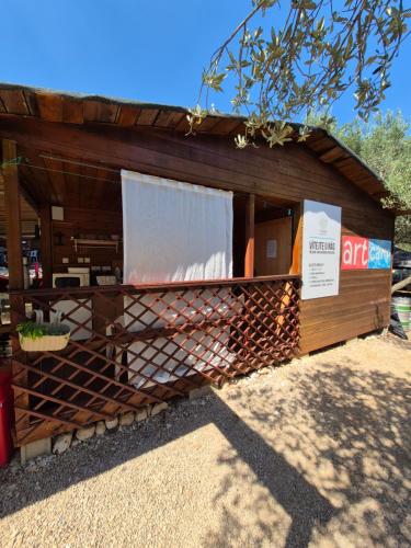 Olive Grove Beachside Cabins 80m from Beach Air-conditioned with Family Spirit under Biokovo