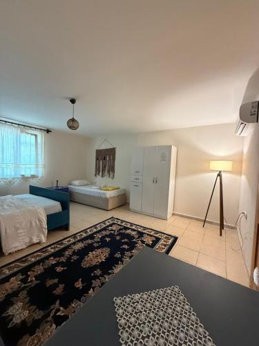 Postel nebo postele na pokoji v ubytování Phaselis Park Camping