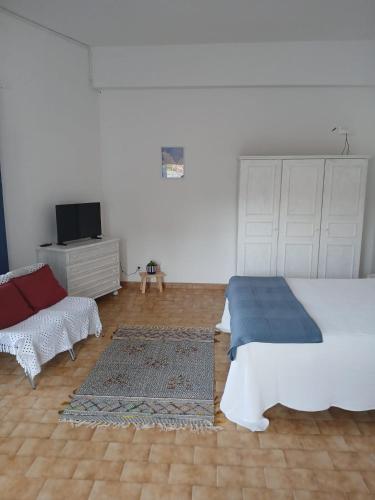 Ένα ή περισσότερα κρεβάτια σε δωμάτιο στο Casa Azul