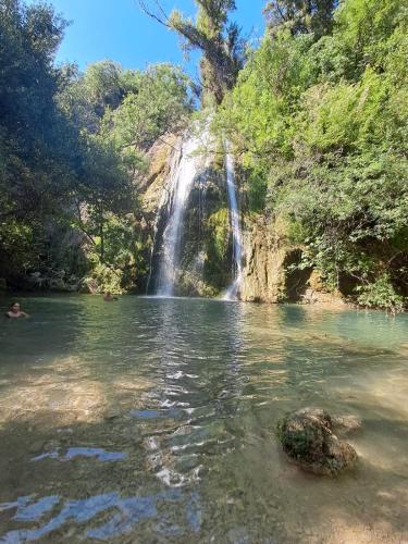 a waterfall in the middle of a body of water at Villa avec piscine, en Provence in Varages