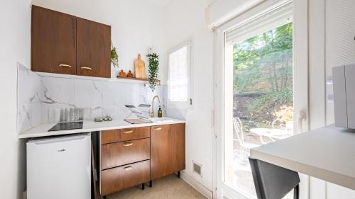 Appartement cosy avec terrasse, accès gare Dijon à pied