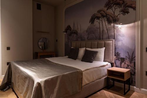 Postel nebo postele na pokoji v ubytování lux-deluxe city apartment