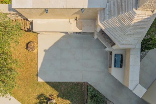 an overhead view of a house with a staircase at Villa PERLA VERDE in Labin