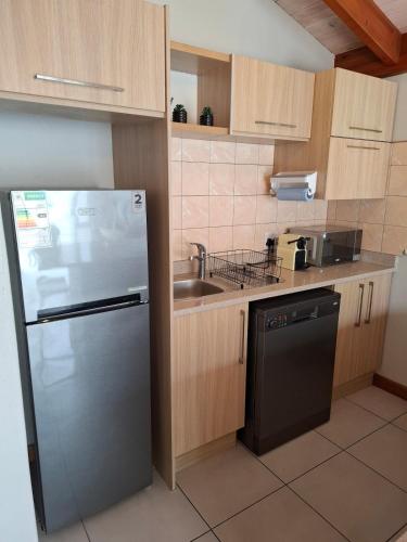 Η κουζίνα ή μικρή κουζίνα στο Suite 24 at Stadtmitte Central