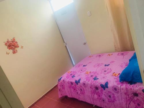 Ένα ή περισσότερα κρεβάτια σε δωμάτιο στο Apartamento Mariela 4