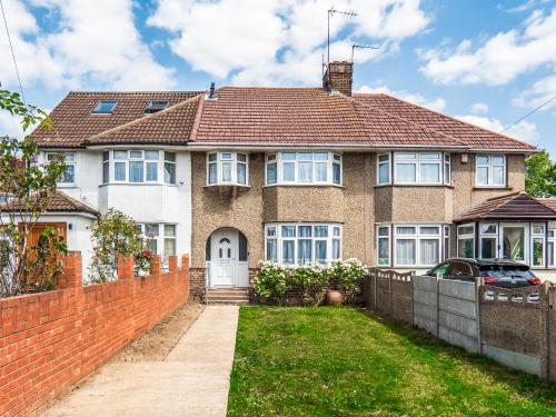 a large brick house with a red roof at Family 4-Bed Wembley Stadium Home - Parking & Long Stays in London