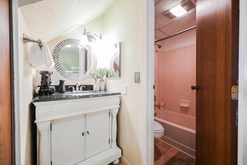 a bathroom with a sink and a toilet at The Hidden Moose in Brian Head