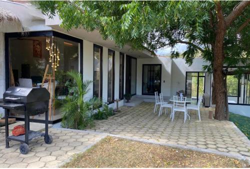 Ein Garten an der Unterkunft Nour Huatulco