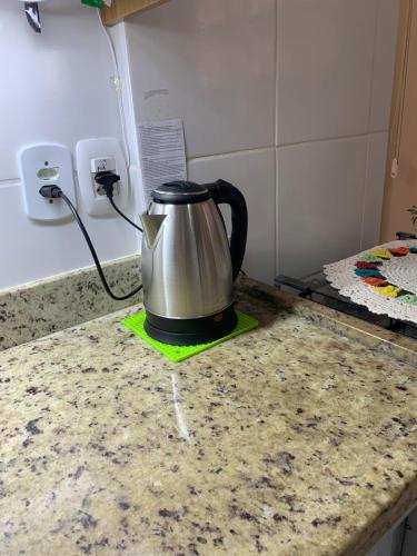 Espaço aconchegante em local privilegiadoにあるコーヒーまたはお茶