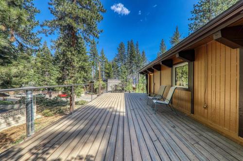 a wooden deck with a bench on a house at Retreat with Private Hot Tub steps North Lake Tahoe in Carnelian Bay