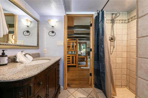 a bathroom with a sink and a shower at Retreat with Private Hot Tub steps North Lake Tahoe in Carnelian Bay