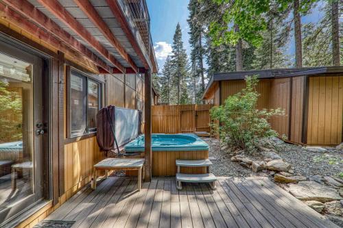 a house with a hot tub on a deck at Retreat with Private Hot Tub steps North Lake Tahoe in Carnelian Bay