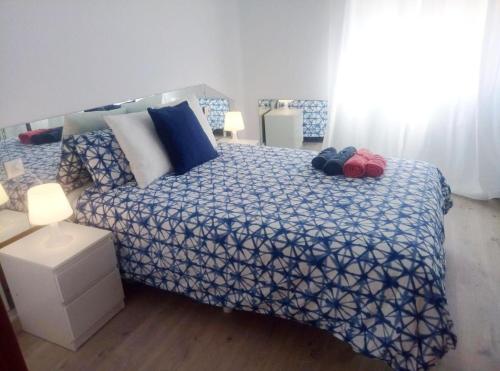 Ένα ή περισσότερα κρεβάτια σε δωμάτιο στο Apartamento amplio, luminoso, tranquilo y a 5 minutos de la plaza mayor