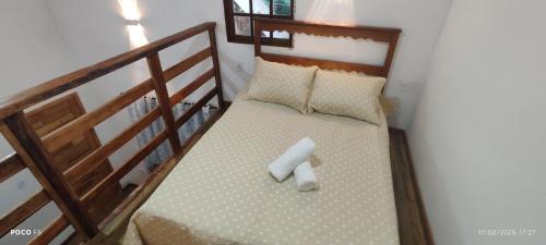 Giường trong phòng chung tại Loft da Bia