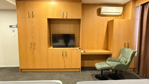 Televizorius ir (arba) pramogų centras apgyvendinimo įstaigoje Goodview Hotel