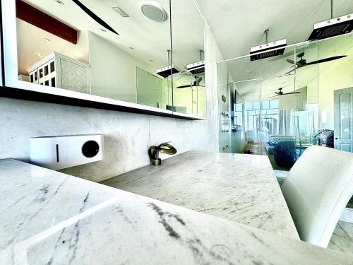 a kitchen with a marble counter and a sink at Vintoca Luxury Honeymoon Suite Farm Retreat in Oceanside