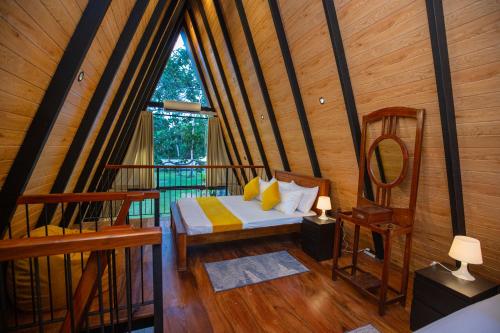 Ένα ή περισσότερα κρεβάτια σε δωμάτιο στο Greenpeak Serene Luxury Cabanas