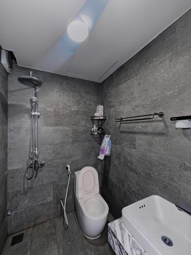 a bathroom with a toilet and a sink at TV-Netflix STU 302 Near Uncle Ho's Mausoleum in Hanoi