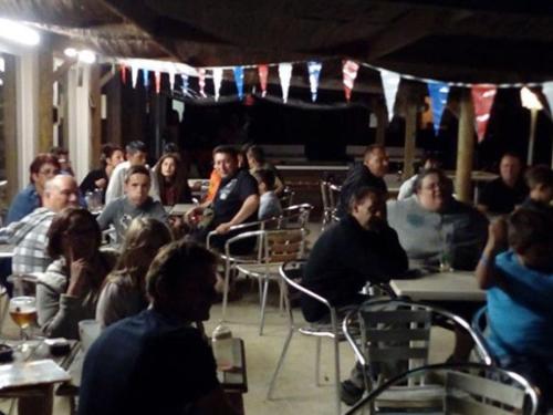 a group of people sitting at tables in a room at Mobil Home 32m² 4 pers, Terrasse à St-Sornin - API-1-52-727 in Saint-Sornin