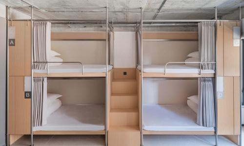 Postel nebo postele na pokoji v ubytování YUE HOTEL