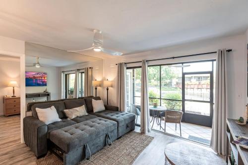 a living room with a couch and a table at Park Shore Resort-Deluxe Condo 1st FloorBLDGE 134 in Naples