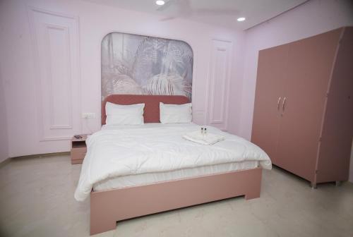 Ένα ή περισσότερα κρεβάτια σε δωμάτιο στο HOTEL LIME WOOD