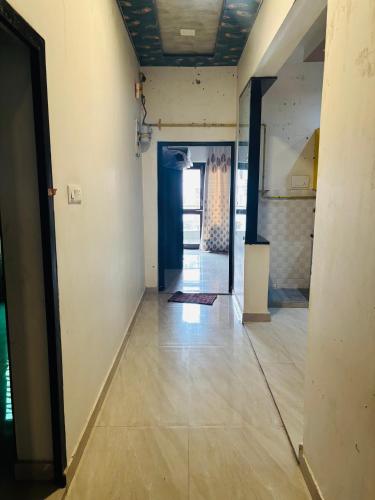 a hallway of a house with a room with a floor at B121 kedar nagar in Agra