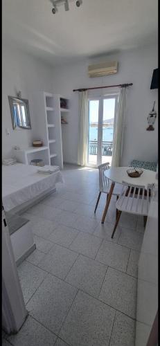 Ένα ή περισσότερα κρεβάτια σε δωμάτιο στο Katerina's Studios