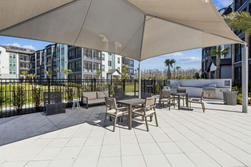 Balkoni atau teres di Landing at Sereno - 3 Bedrooms in Wimauma