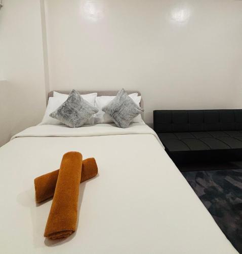 Ένα ή περισσότερα κρεβάτια σε δωμάτιο στο Chic and Comfortably Cozy