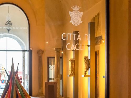 a store window with a sign that reads critical d cork at Cozy Couple s Retreat in Acqualagna