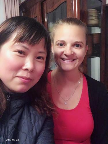 two women are standing next to each other at Hannan - House / Vacation STAY 47627 in Hannan