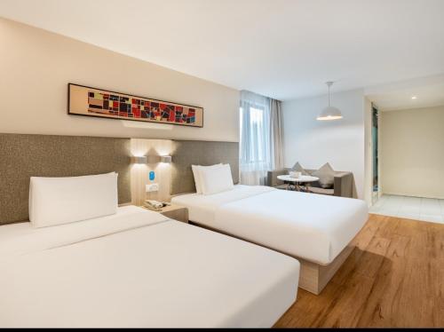 Katil atau katil-katil dalam bilik di Hanting Hotel Beijing Wukesong Yongding Road