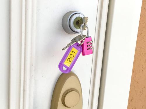 a house key is attached to a door at Pension Marinetown Aratta Vacation STAY 13299 in Yonabaru