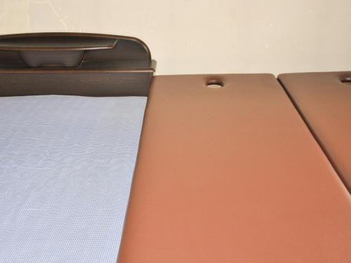 a close up of a bed in a room at Kawagoe - House - Vacation STAY 16212 in Kawagoe