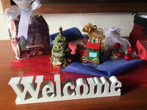 a christmas display with a train on a blue napkin at Nikko Guest House / Vacation STAY 16645 in Nikko