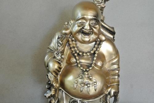 a bronze statue of a woman wearing a necklace at Nikko Guest House / Vacation STAY 16645 in Nikko